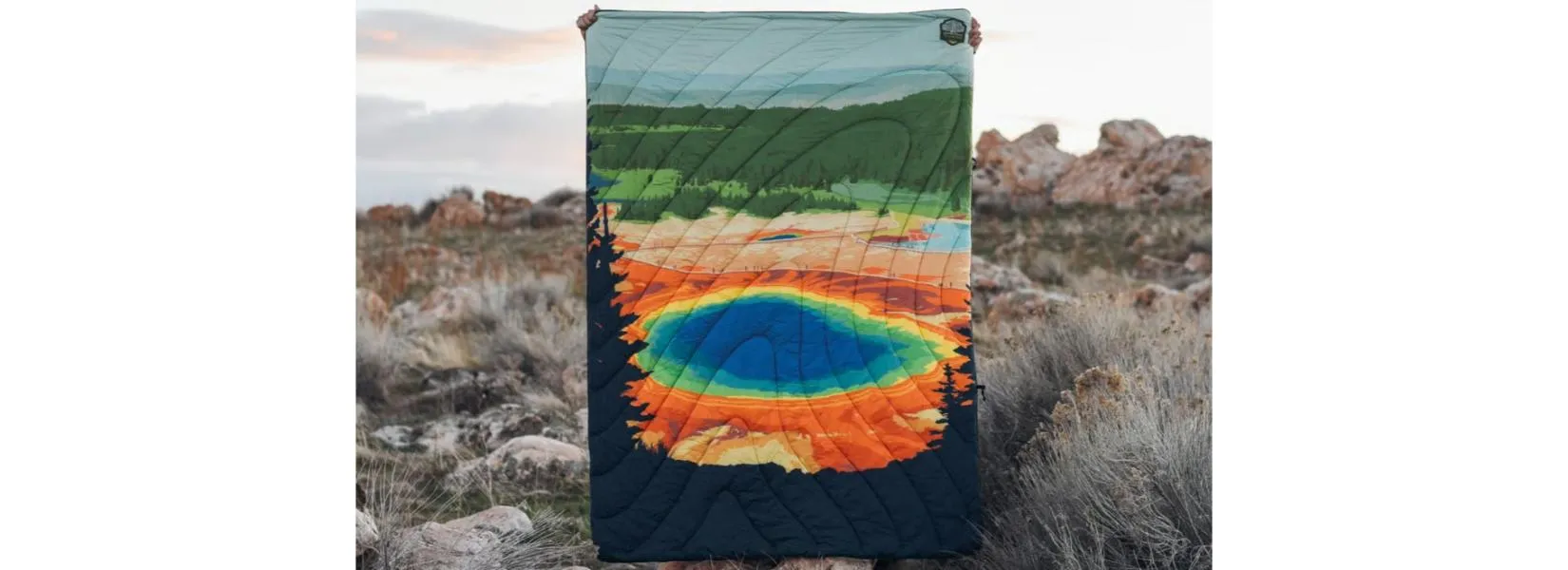 Beautiful blanket depicting Grand Prismatic Spring with sustainable Yellowstone merchandise